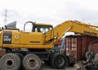 Экскаватор колесный  KOMATSU  PW 200   2006  г. доставка по РФ